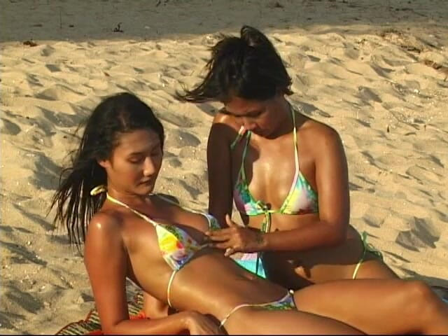 Asian Cuntz: Adorable skanks doing photo shoot on the beach
