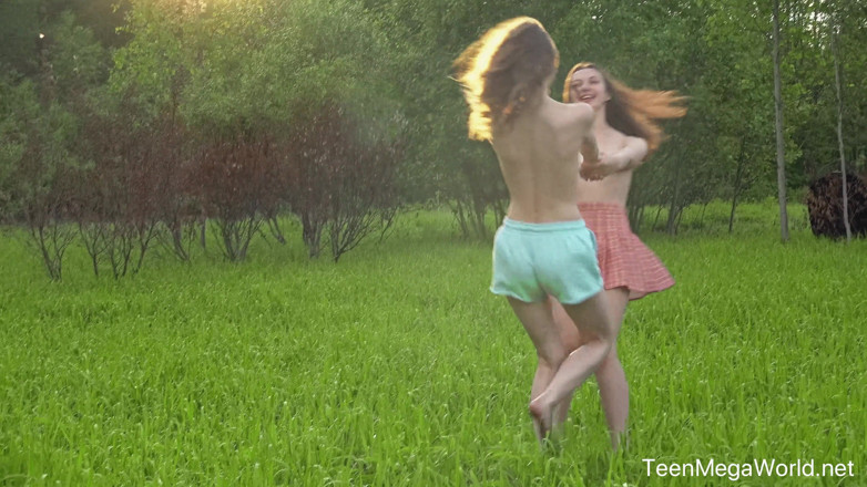 Teen Mega World: Hot Chicks Lick Clits in Field