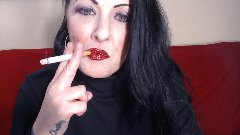 Abby Anna: Closeup smoking red glittered lipstick