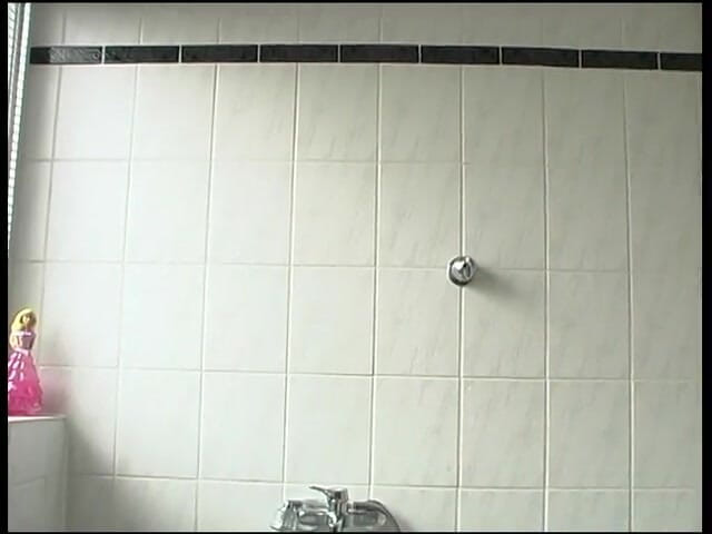 Lucky Cooch: Pierced short hair chick is taking a shower