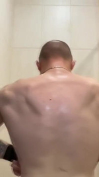 Alpha Shows off His Back Muscles