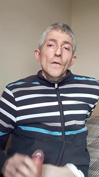 Masturbating in Tracksuit Top.