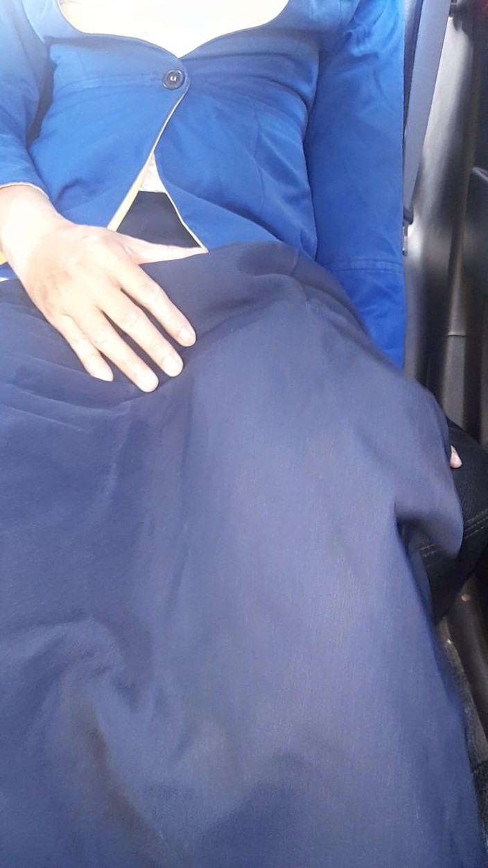Naomisinka: Crossdressing bär kvinna Bca Bank uniform