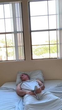 Watching Him Drift Between Shirts and Shorts