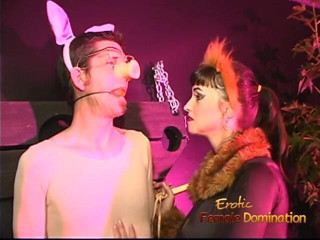 Erotic Female Domination: Busty femdom whipping ball gagged slave in costume