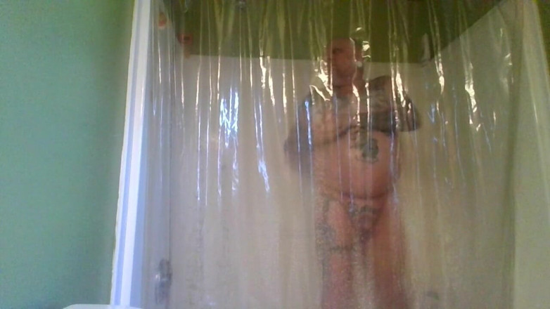 City hog: Shower a tattooed bottom bear