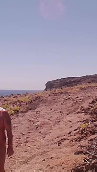 Couple Is Hiking Naked Near the Coast