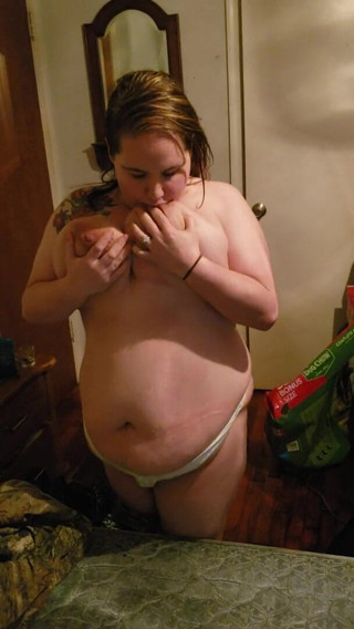 Country Baby: Curvy bbw playing with a huge strap on