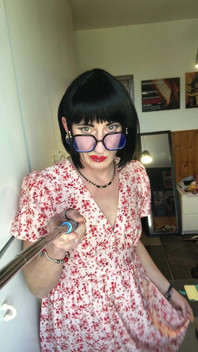 Andreina the Sissy Wearing Black Nails