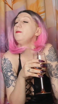 Lady Angela Femdom Goddess Spitting Into a Glas Then Pouring It Out