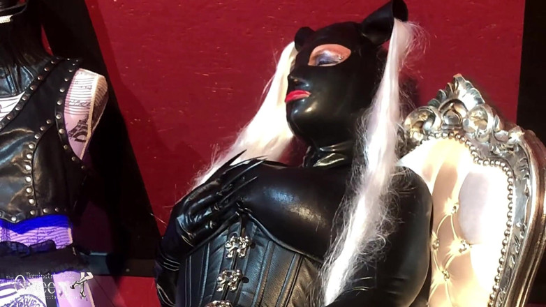 Dominatrix Frida: Dominatrix Frida in latex catsuit - tight corset - ballet boots - long...