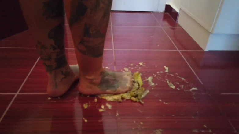 Fetish videos by Alex: A Banana Is Trampled by a Blonde Tattooed MILF