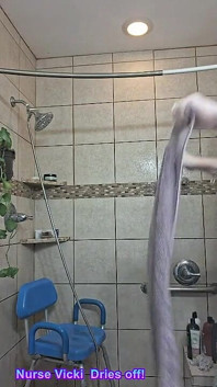 After a Hot Sshower Nurse Vicki Dries off and Does Some Other Grooming