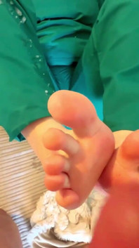 Stepmommy Nurse Gives Stepson a Footjob