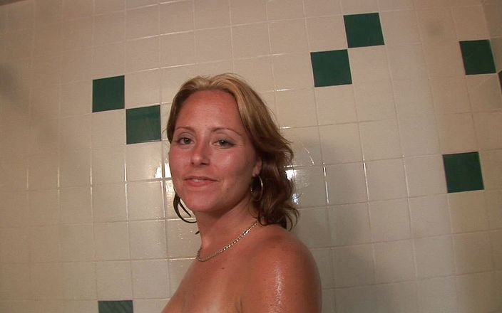 CBD Media: Chubby MILF gets filmed fingering her pussy in the shower