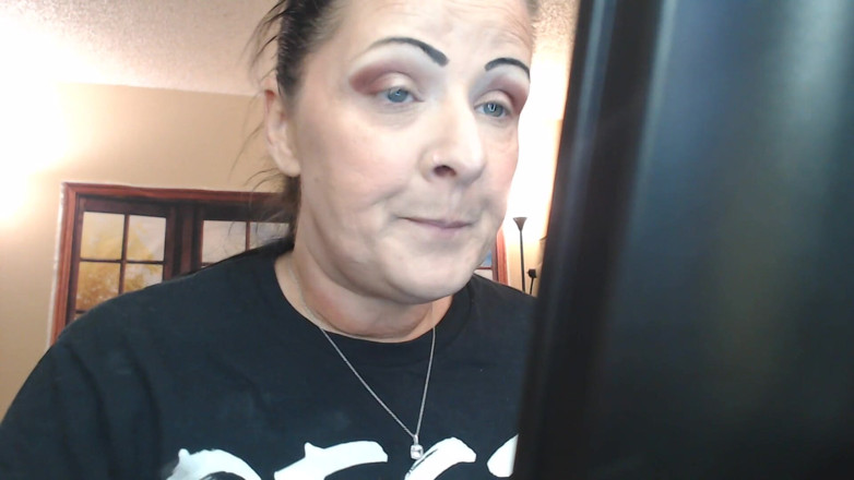 Abby Anna: Doing make up dangling smoke