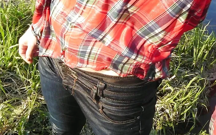 Alexa Cosmic: Swimming in Jeans and Shirt in River.