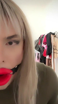 Gagged, Dressed and Sucking Hard