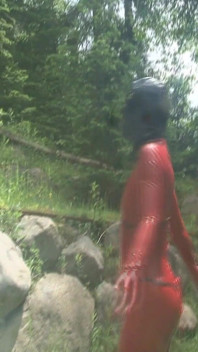 The Vampire Stalks by Daylight in Latex