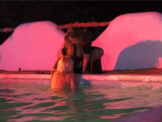 Naughty Girls: Two sexy lesbian chicks are swimming together in the swimming...