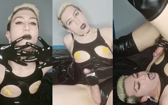 Viper Fierce: Kinky sissy in shiny latex bodysuit and high boots plays...
