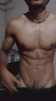 A Muscular Teen Boy Show His Body