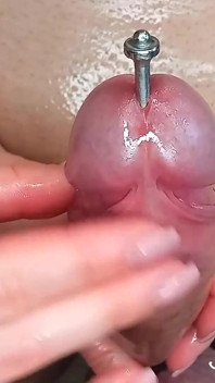 Het blokkeren van sperma in een pulserende orgastische pik