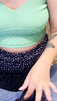 A girl with a tattoo on her arm licks her boyfriend's dick at home