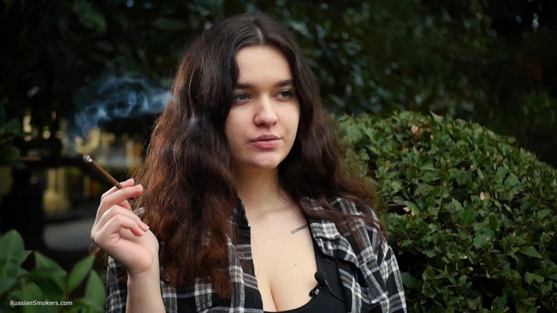 Russian Smokers: Sweet and Busty Russian Babe Smoking Cigarette in Nature