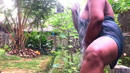 Naughty Jaanu: Indian desi bhabhi outside bathing wearing see through nighty and...