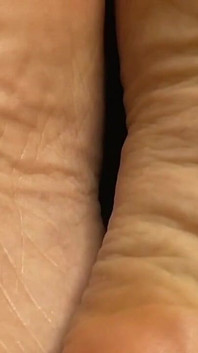 Extreme Close-up of Pink Foxx's Soles