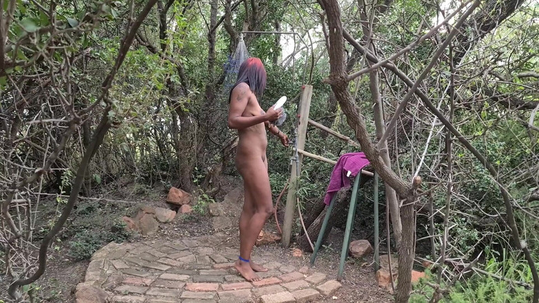 domslutfucker: Dark Tattooed Desi Slut Taking a Shower in the Woods...