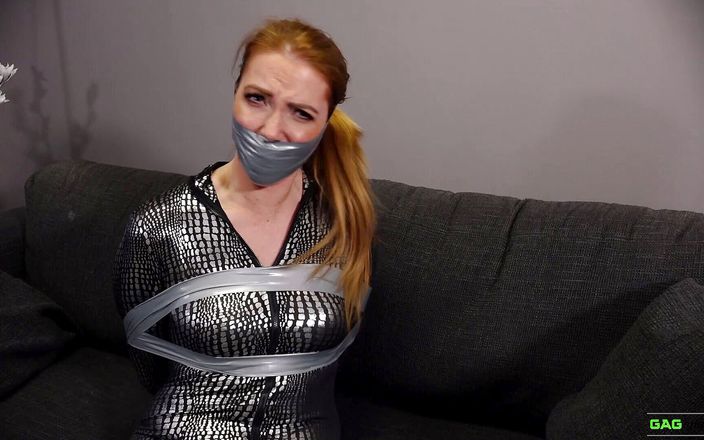 Gag Attack!: Mila - Red head catsuit crook in tape bondage