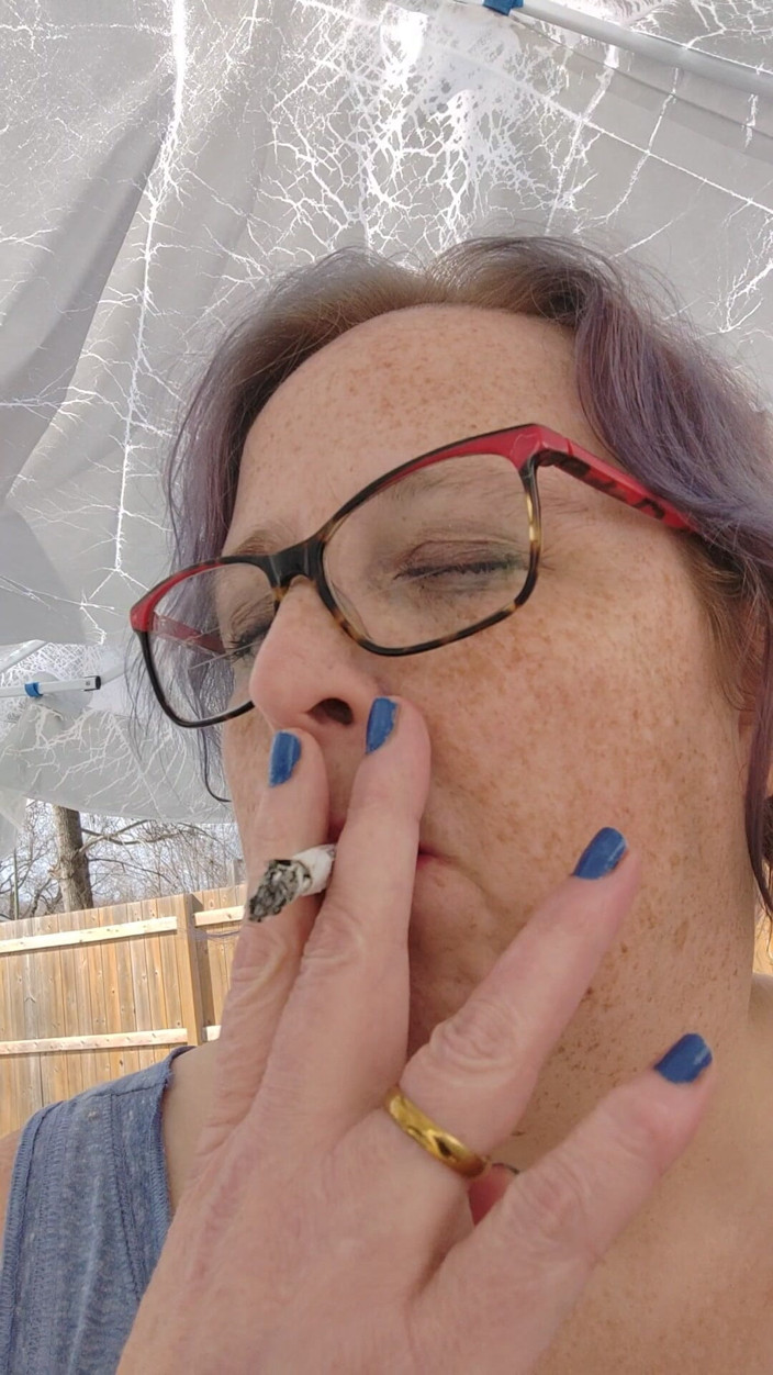 AngYourDirtyCanadian: Calm Outdoor Smoking Moment with a Playful Lipstick Look