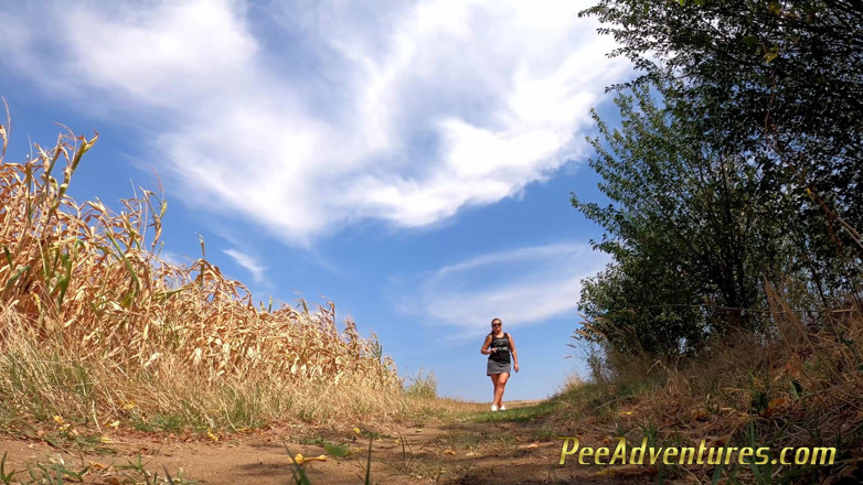 Pee Adventures: Chubby brunette pee on a dirt road in the middle...