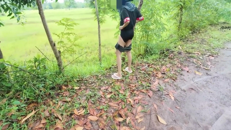 RealThaiSolo: Thai Girl Walking Showing Along the Side of the Field...