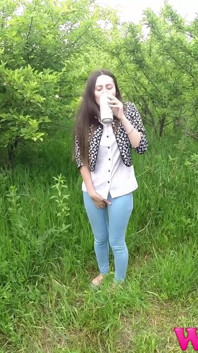 Skinny Brunette with Full Bladder Has to Pee in the Forest and Wet the Tall Grass Touching Her Wet Pussy