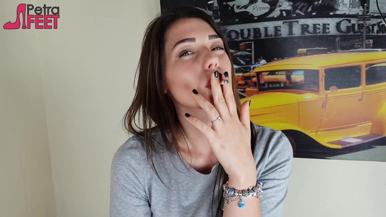 Smokin Fetish: Gorgeous brunette smokes a cigar in her bedroom
