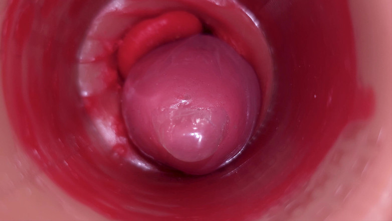 Creme sperm: Dentro de una cámara camgirl cervix en primer plano en...