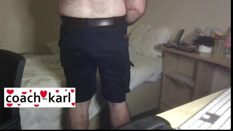 Coach Karl dude lodge: Coach Karl shows off his blue shorts