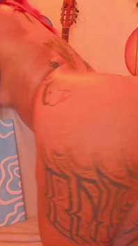A Latina with a Tattooed Body Is Shaking Her Butt for You