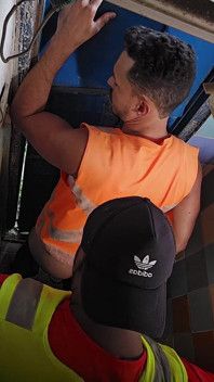 Construction Site Bathroom and Workers