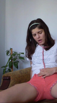 Kinky Redhead Spred Her Legs and Pee in Her Short Pants