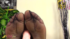 Tranny in pink sexy lingerie doing footjob on dildo thumbnail