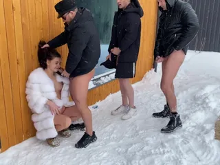 A Group of Guys Banging a Pregnant Woman Outside in the Snow