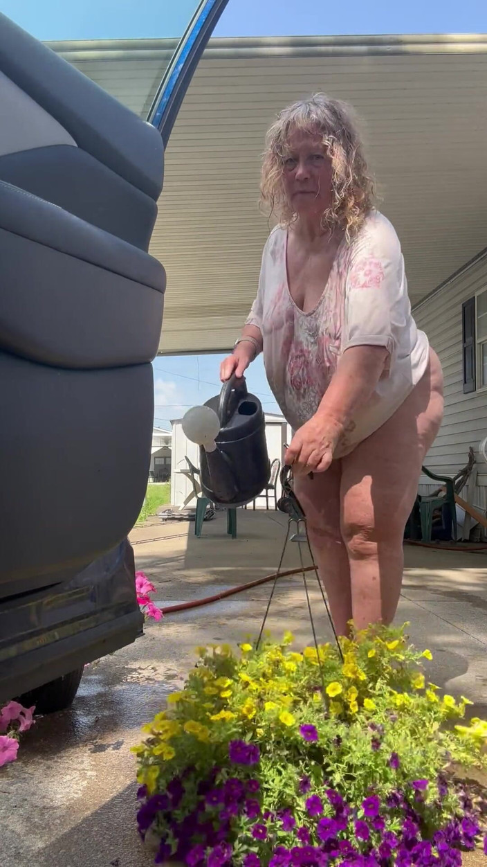 Big Ass 4 U: Watering Flowers Flashing Tits and Ass
