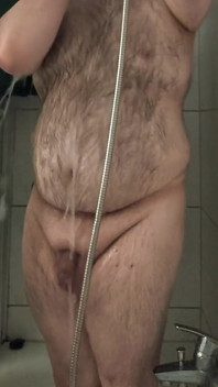 Fat Bear Taking a Shower