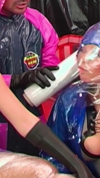 Steamy Rainwear Fetish Threesome with Horny Babes