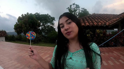 Sara films: Horny slut sucks paddle and shows her tits