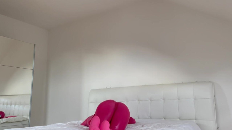 PervyLara: Pink Rubberdoll in Bedroom